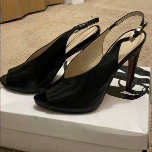 Smooth black leather sling backs
